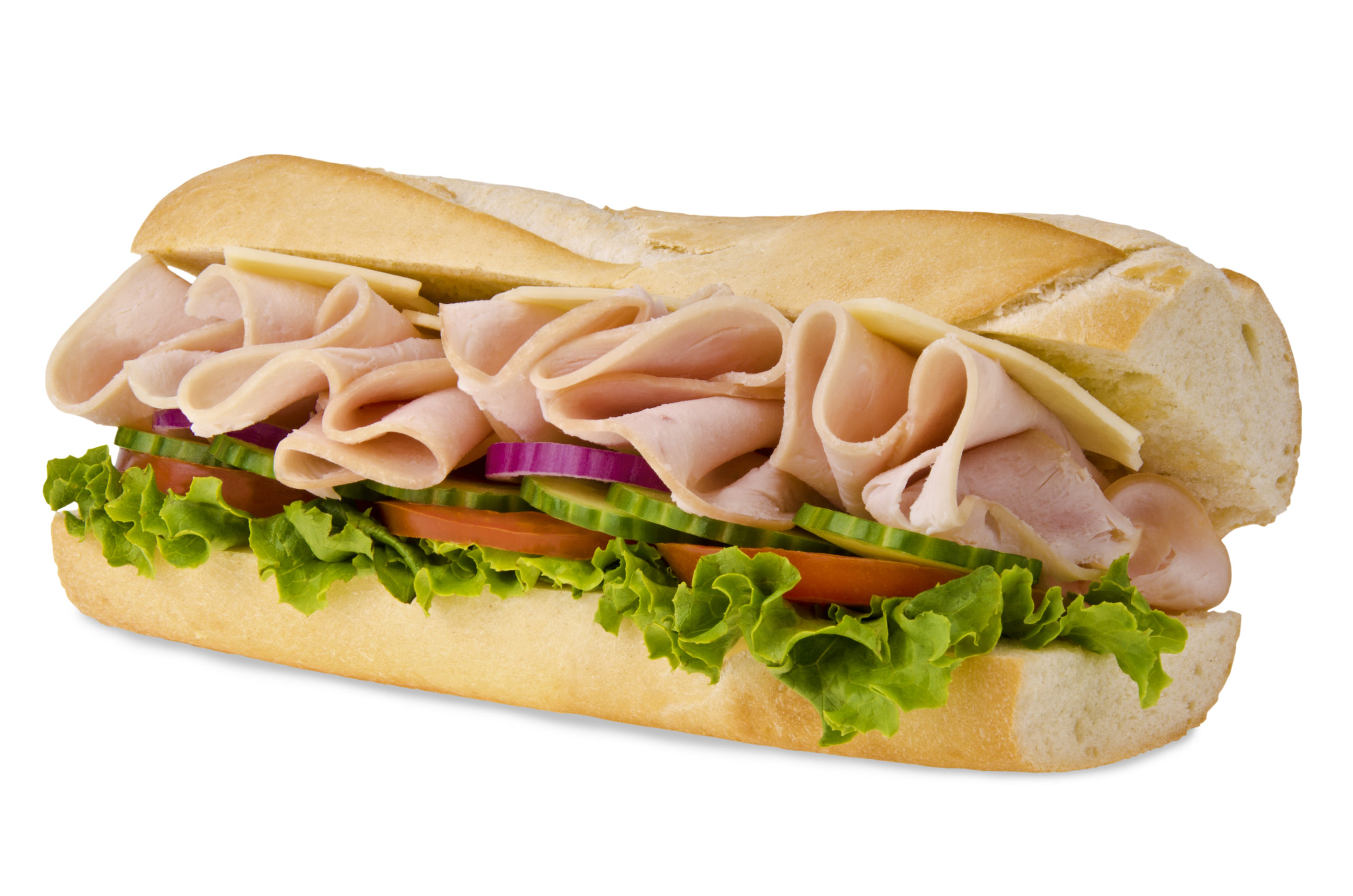 A sub sandwich overflowing with ham