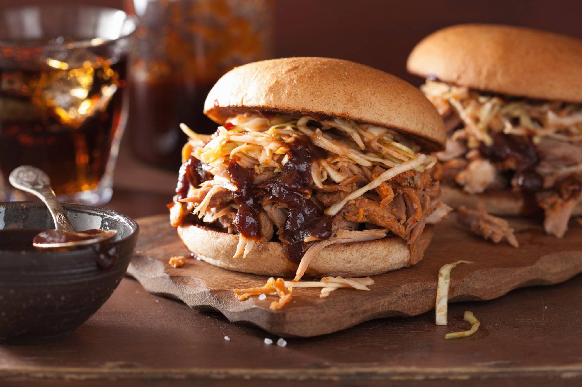 homemade pulled pork burger with coleslaw and bbq sauce homemade pulled pork burger with coleslaw and bbq sauce